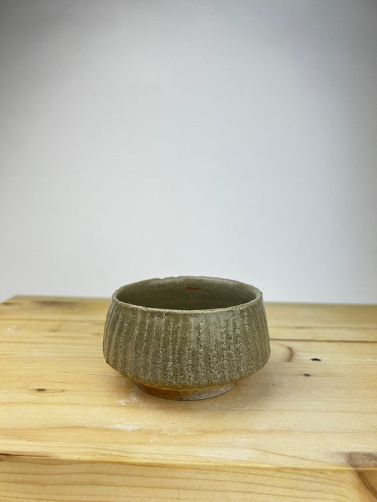 Textured celadon cup