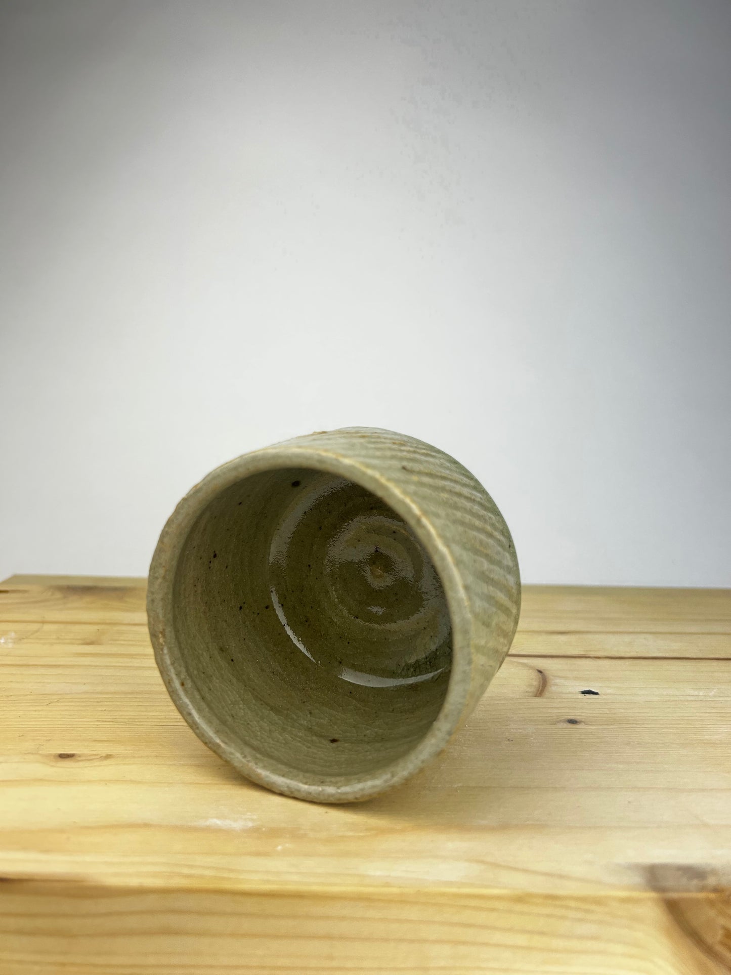 Textured celadon cup