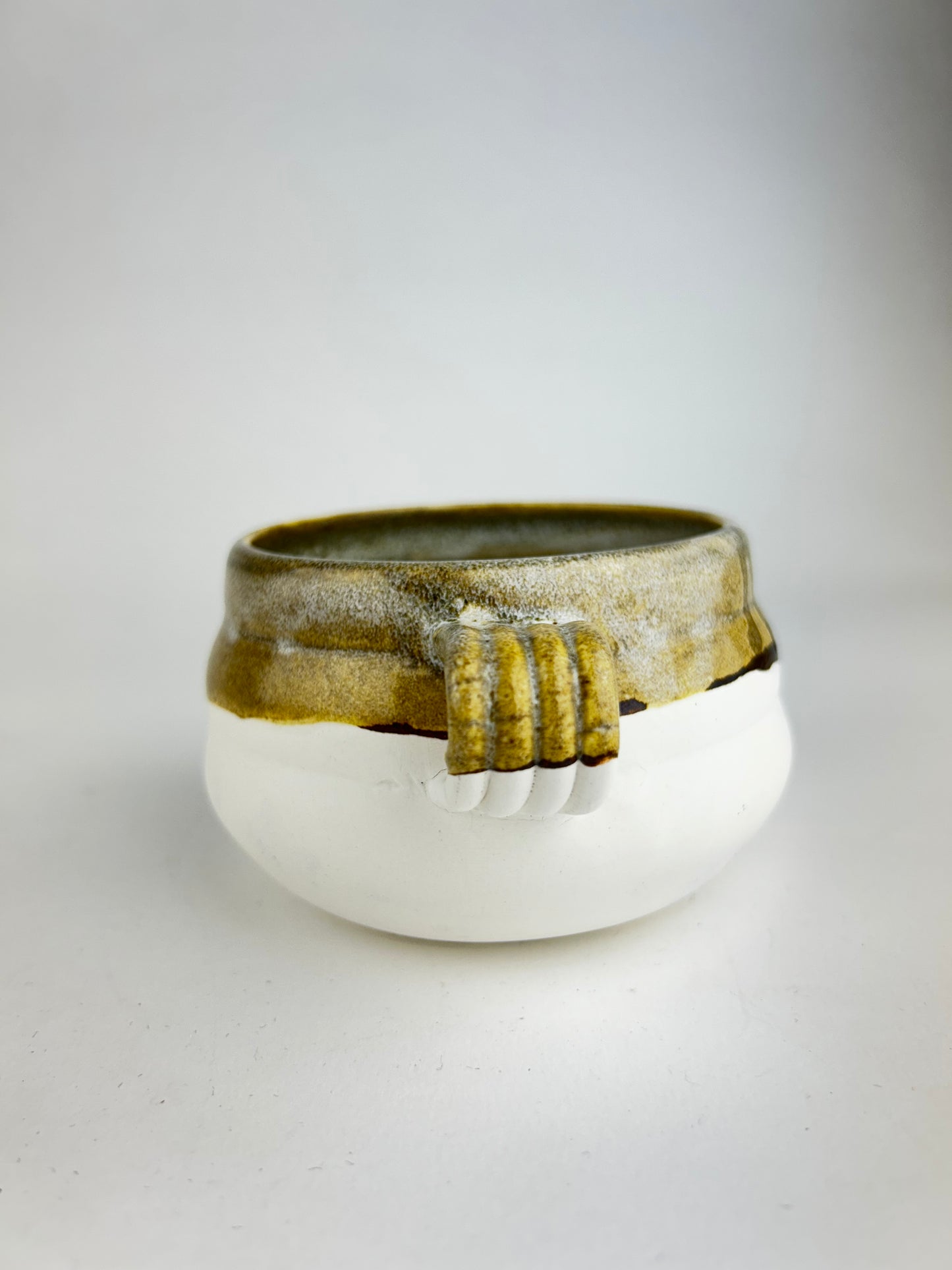 Brown oil mug
