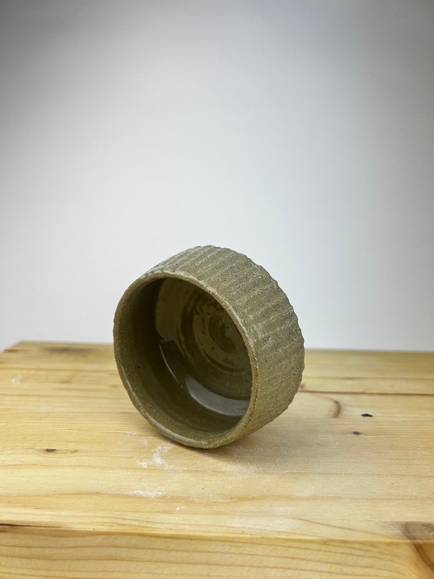 Textured celadon cup