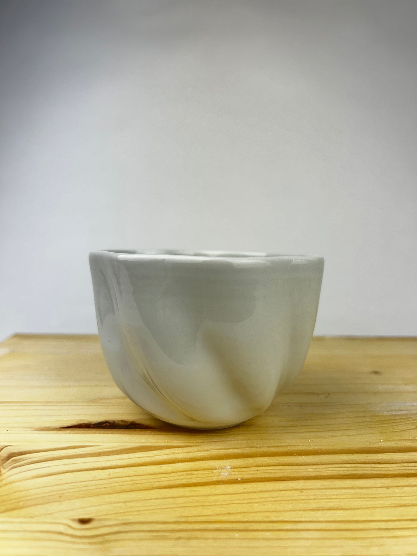 Cream porcelain cup