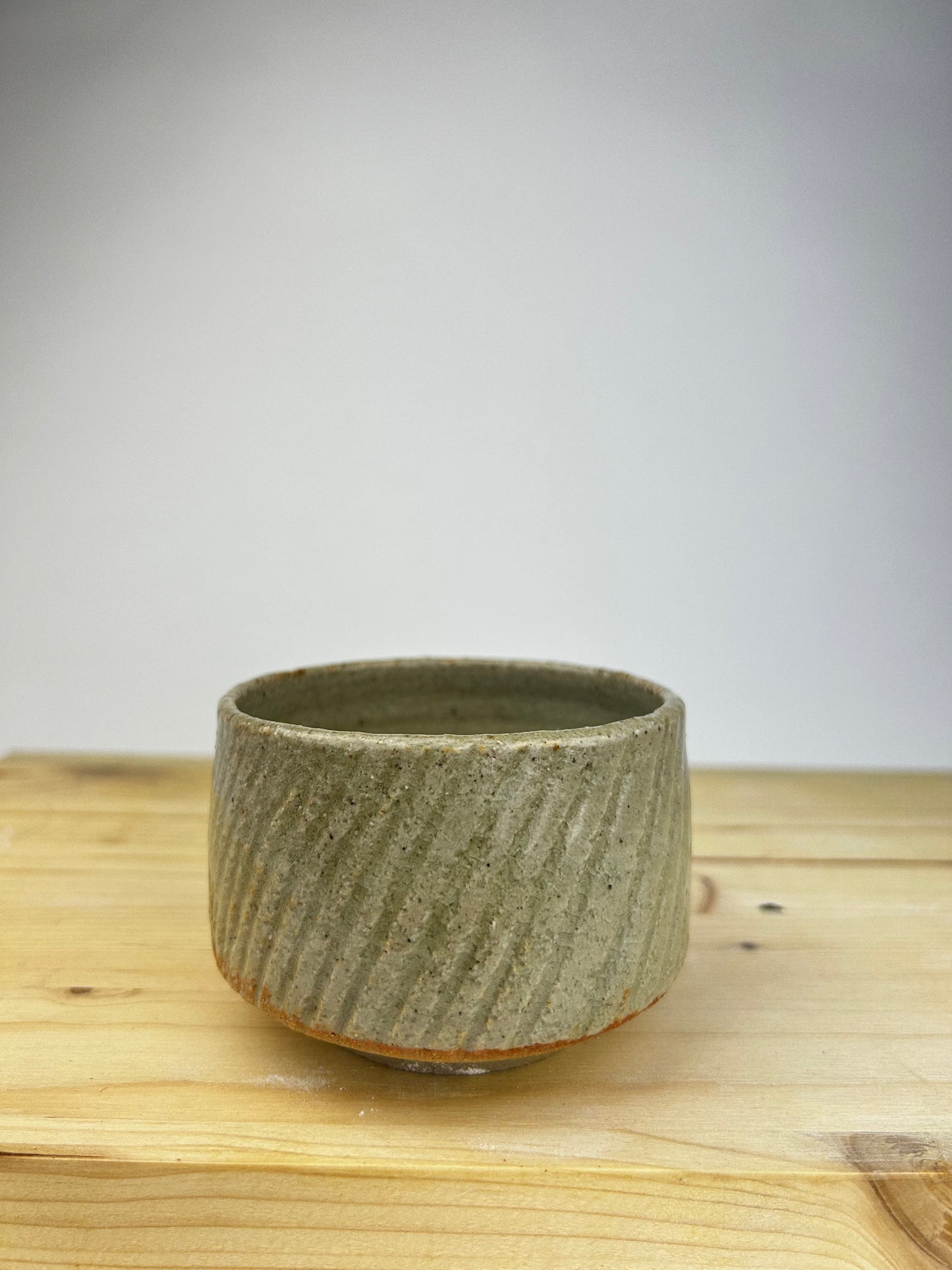 Textured celadon cup