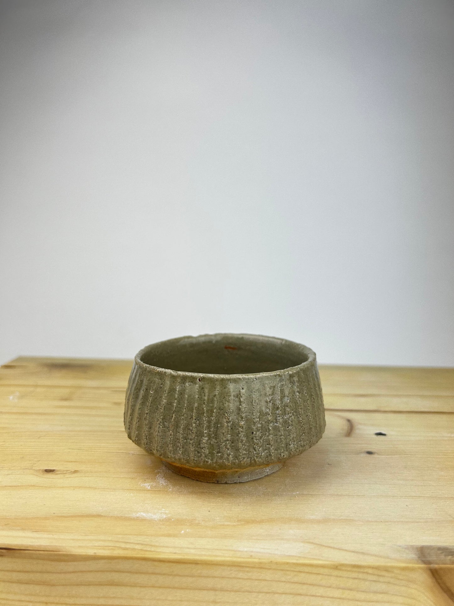 Textured celadon cup