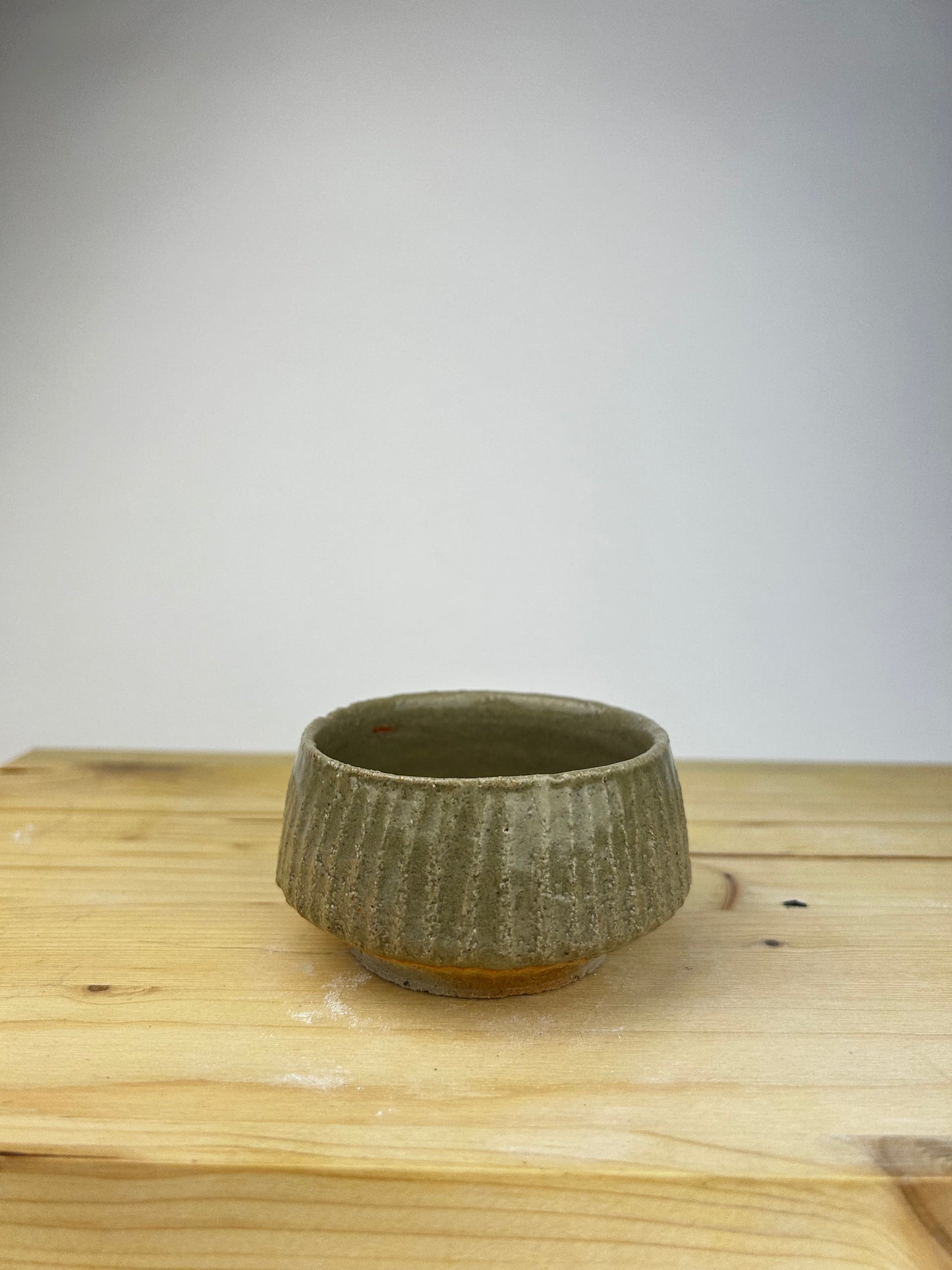 Textured celadon cup