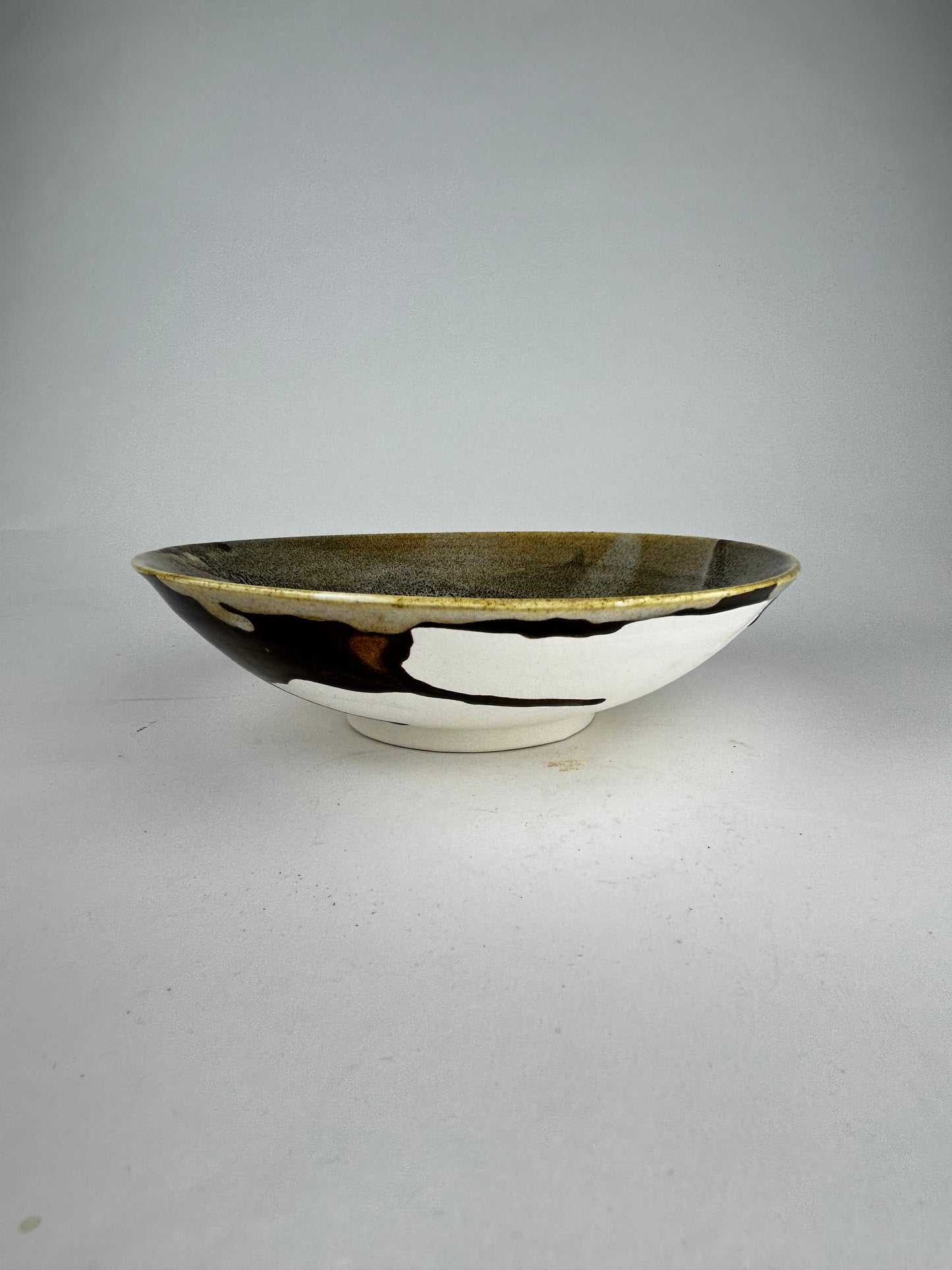 Brown oil bowl