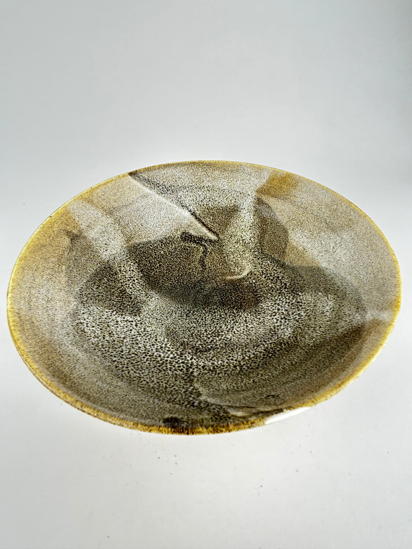 Brown oil bowl