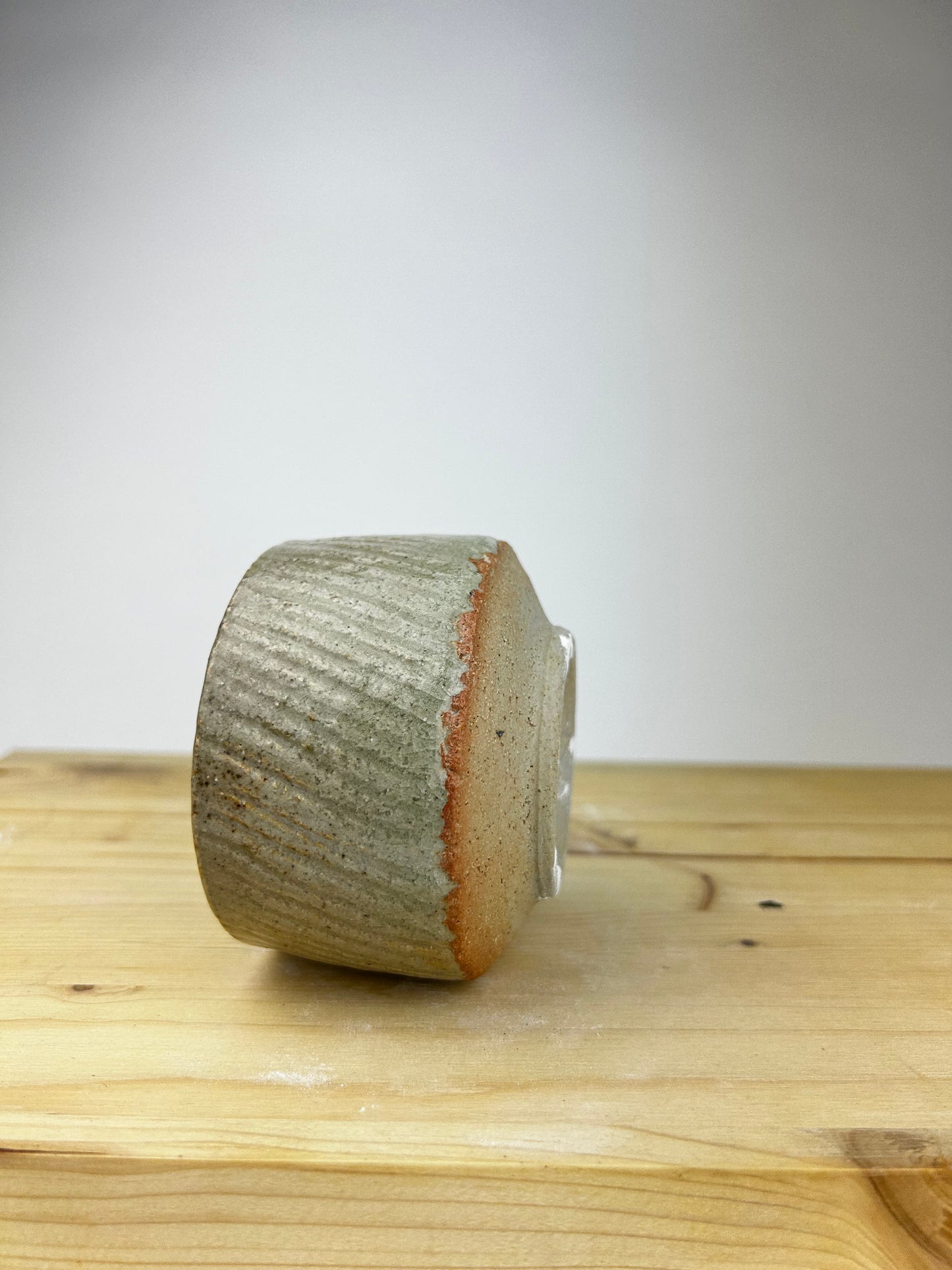 Textured celadon cup